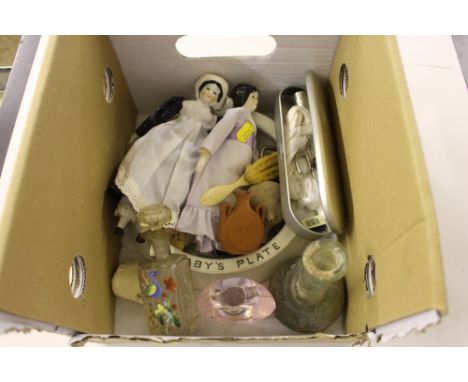 A quantity of various items to include two porcelain headed dolls; a china baby's plate; an enamel decorated scent bottle; an