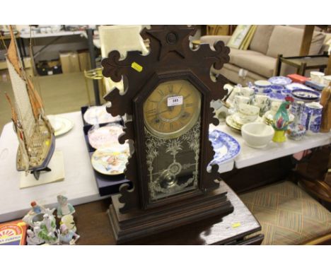 A late Victorian two hole mantel clock