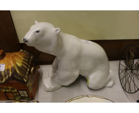 A white glazed USSR china model of a Polar Bear