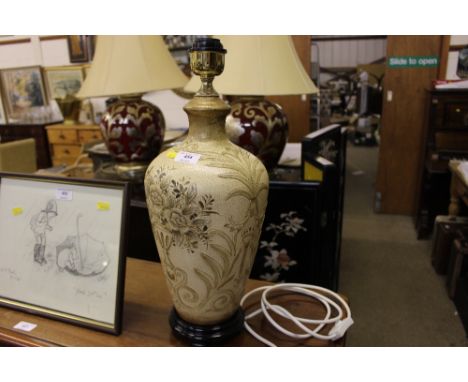 A floral decorated table lamp base