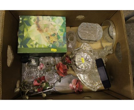 A box of various decorative glassware