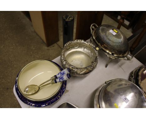 A plated revolving breakfast dish; a plated floral embossed rose bowl and a Carlton ware salad bowl and servers with plated m