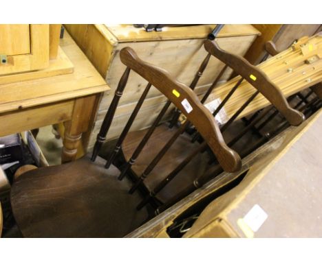 A set of six mahogany stick back dining chairs