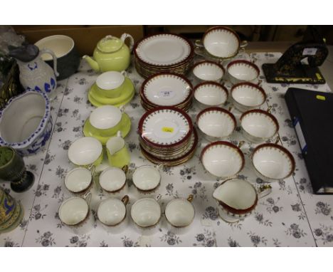 A quantity of Aynsley red and gilt decorated tea and coffee ware; and Royal Worcester tea ware