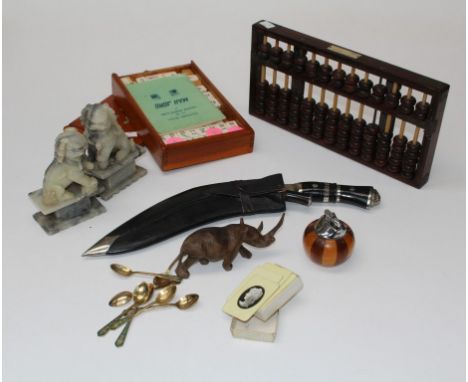 An abacus, maj jong set, a Ronson wood lighter, a kukri set (missing a knife), a pair of hardstone dogs of fo, a set of orien