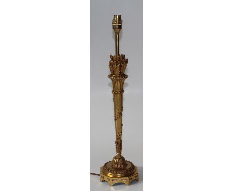  A gilt bronze table lamp, 20th century, in the form of a quiver of arrows, the lamp stem and arrows protruding from the lape