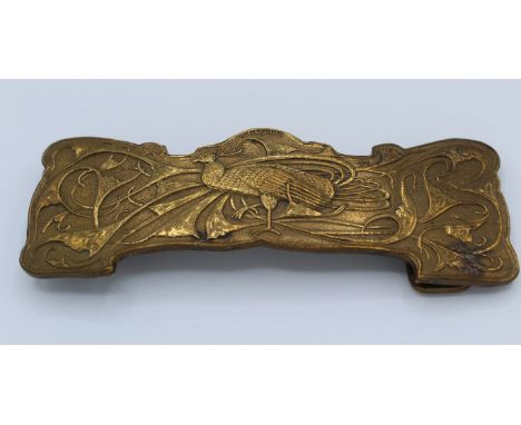 A Rene Lalique signed bronze belt buckle featuring a stylised Art Nouveau peacock, 11.5 x 3.8cm