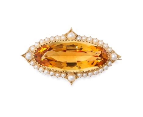 AN ANTIQUE CITRINE AND PEARL BROOCH, 19TH CENTURY in yellow gold, set with an oval cut citrine of 16.50 carats within a borde