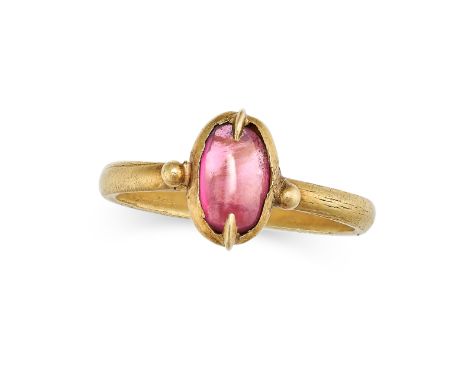 A GARNET RING in yellow gold, set with a cabochon cut garnet, no assay marks, size N1/2 / 7, 3.5g.&nbsp;