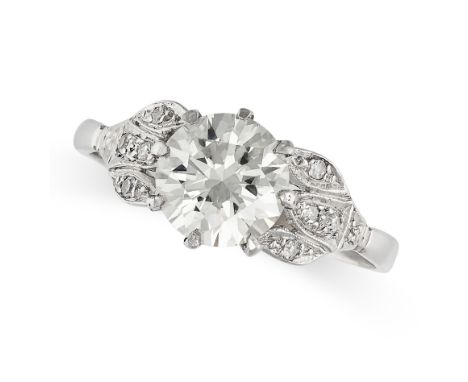 A SOLITAIRE DIAMOND ENGAGEMENT RING in platinum, set with a round brilliant cut diamond of approximately 1.43 carats, the sty