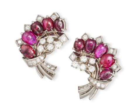 A PAIR OF VINTAGE RUBY AND DIAMOND EARRINGS set with oval cabochon cut rubies and round cut and French cut diamonds in a spra