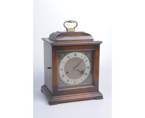 A mid 20th Century mahogany cased Smith's presentation clockThe architectural case with domed top and applied brass loop hand