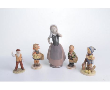 A collection of figuresTo include a group of three Goebel Hummel figures, a Royal Albert figure Mr McGregor (second) and a Na