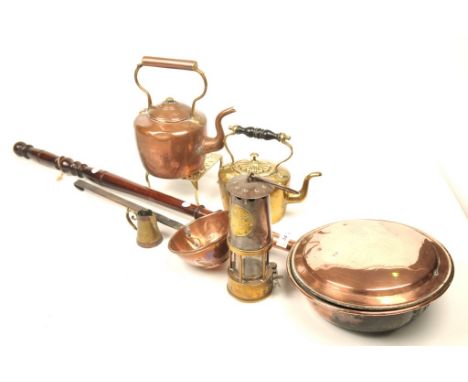 A mixed collection of metalwaresTo include a No 65 Eccles Manchester miners lamp, a copper warming pan, kettle and ladle and 
