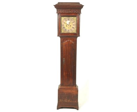 An 18th Century oak long case clock H Fisher, PrestonThe caddy top above a blind fret work frieze over the ten inch brass dia