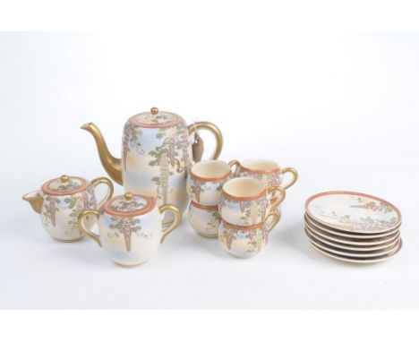 A Japanese Satsuma tea service, circa 1920To include teapot, milk jug, sugar bowl, six teacups and six saucers, all decorated