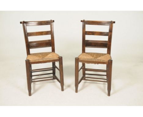 A pair of early 20th Century stained beechwood chapel chairsEach with a ladder back and rear book trough above an envelope ru