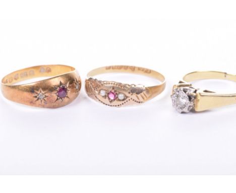 A diamond and ruby three stone ringGypsy set, to an 18ct gold setting, together with, a diamond solitaire ring, illusion set 