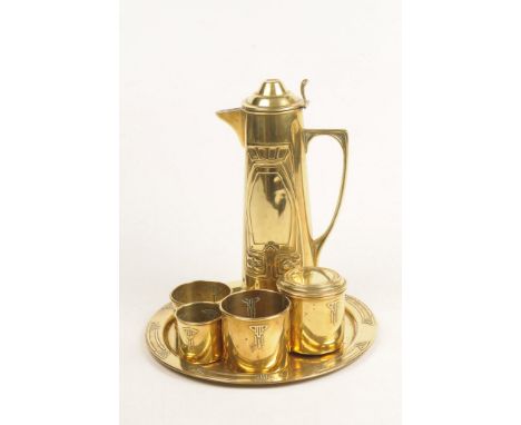 A brass Art Nouveau style coffee set Comprising serving plate, coffee pot, covered sucrier and three circular receptacles wit