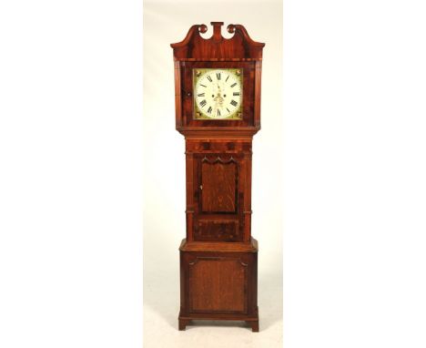 A mid 19th Century oak and mahogany cased longcase clock, Davies of Chester
The twin swan neck pediment above a pair of clust