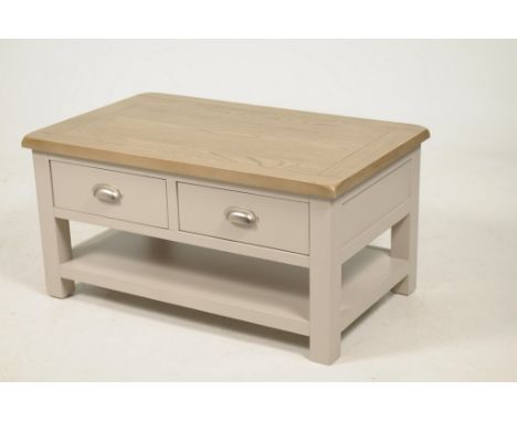 A stained oak and painted centre tableThe stained oak slab top above two frieze drawers each with brush metal cup handles ove