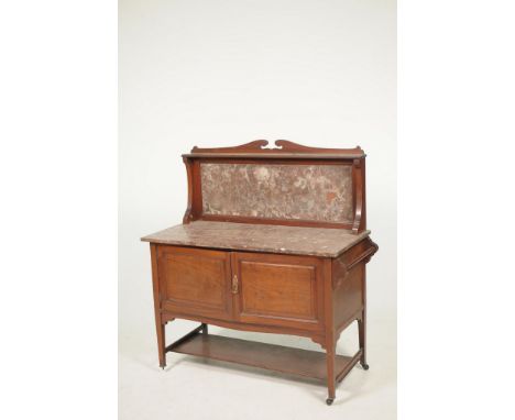 An Edwardian inlaid  mahogany marble top wash standThe rouge marble top and raised back above a pair of cupboard doors and to