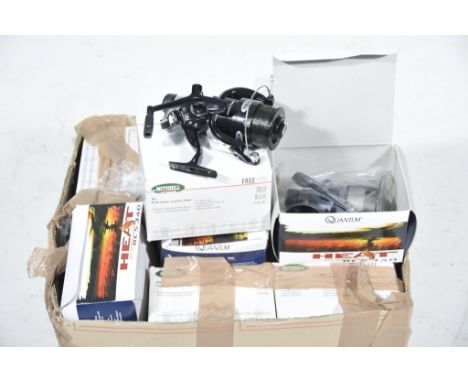 A collection of fishing reelsMitchell model free 5500 (approximately ten) and Quantum Heat spinning reels (some spares or rep