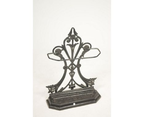 A Victorian cast iron stick standCast with an openwork interlaced upright and leafy terminals above a rectangular tray with c