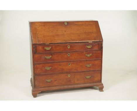 A Georgian mahogany bureauThe fall front enclosing a compartmentalised interior above four long cockbeaded drawers each with 