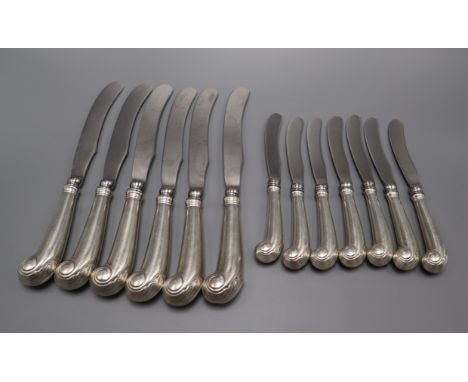 A set of six American Steiff Company Williamsburg Restoration sterling pistol handled table knives and seven matching tea kni