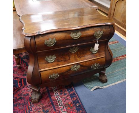 A Dutch figured walnut bombe commode W.84cm