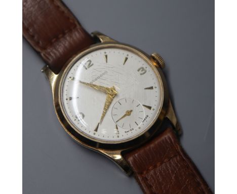 A gentleman's yellow metal Garrard manual wind wristwatch, c.1962; cased.