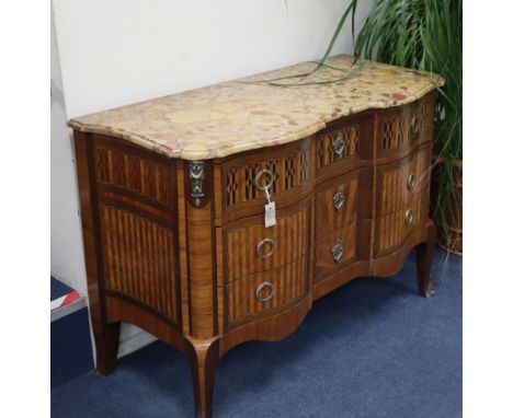 A French transitional style marble top bombe commode W.128cm