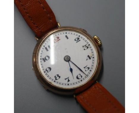 A lady's early 20th century 9ct. gold manual wind wristwatch.