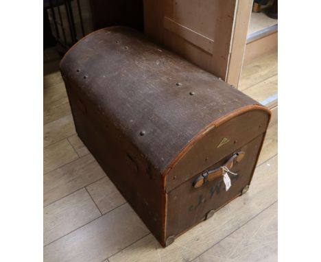 A Victorian canvas covered trunk with domed top W.85cm
