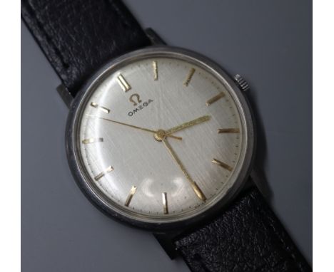 A gentleman's 1960's stainless steel Omega manual wind wrist watch, movement c.600, on later associated strap.