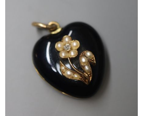 A Victorian yellow metal, black enamel, seed pearl and diamond set heart shape mourning locket, with interior inscription, 20