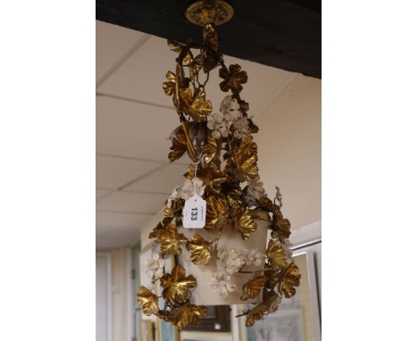 A gilt metal floral light fitting