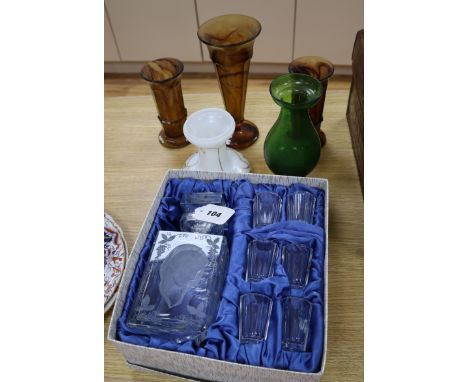 A Czech engraved glass decanter set and five glass vases