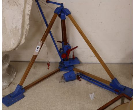 A vintage cast metal model of a Derrik Crane