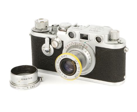 A Leica IIIf Delay Red Dial 'British Military' Rangefinder Camera, 1954, chrome, serial no. 694025, with Leitz Elmar f/3.5 50