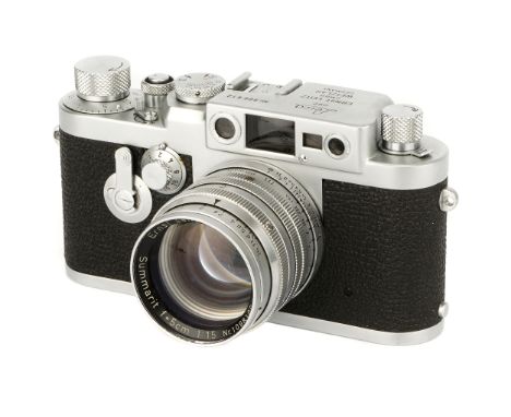 A Leica IIIg Rangefinder Camera, 1957, chrome, serial no. 906612, with Leitz Summarit f/1.5 50mm lens, 1953, chrome, serial n