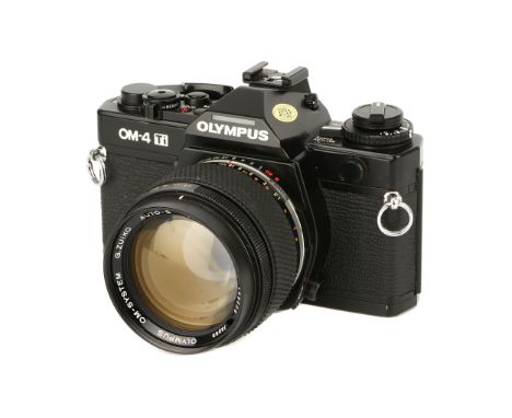 An Olympus OM-4Ti SLR Camera, 1986-2002, black, serial no. 1174657, with G.Zuiko Auto-S f/1.2 55mm lens, black, serial no. 14