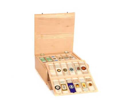 A good collection of Microscope Slides, case, c. Mid 20th Century, constructed of polished light wood, with fold up top with 