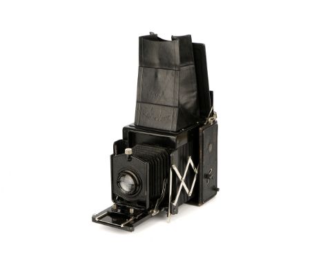 A Ernemann Ernoflex Model II Camera, 1922-26, 9x12cm black, with Carl Zeiss Jena Tessar f/4.5 180mm lens, black, serial no. 5