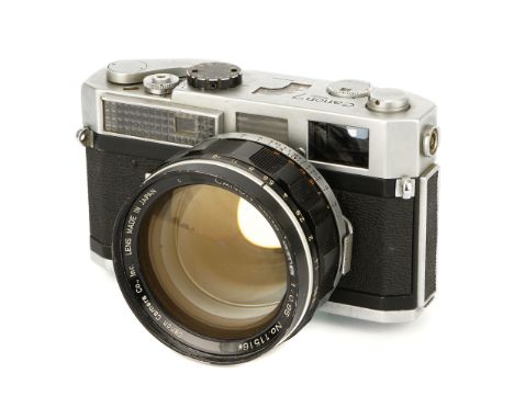 A Canon 7s Rangefinder Camera, 1965-67, chrome, serial no. 878196, with Canon f/0.95 50mm lens, black, serial no. 11516, body