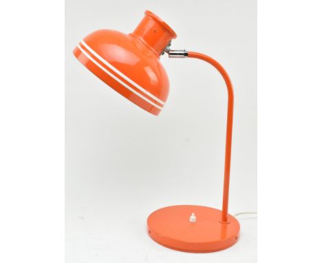 Luco of Sweden - a retro 1970s Swedish design orange enamel desk lamp. The bedside lamp in bright orange colourway, featuring