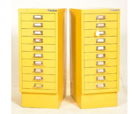 Bisley - a vintage mid century pair of industrial office filing cabinets in mustard yellow. Each cabinet complete with ten dr