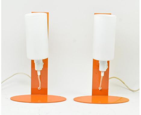 A pair of vintage painted metal &amp; frosted glass minimalist desk table lamp lights. Each lamp having an orange panel back 