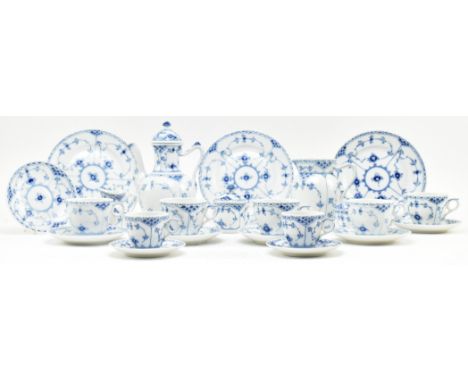 A 1960s Royal Copenhagen porcelain blue fluted pattern part tea service. The lot comprising a hot water pot, a pitcher, a sug